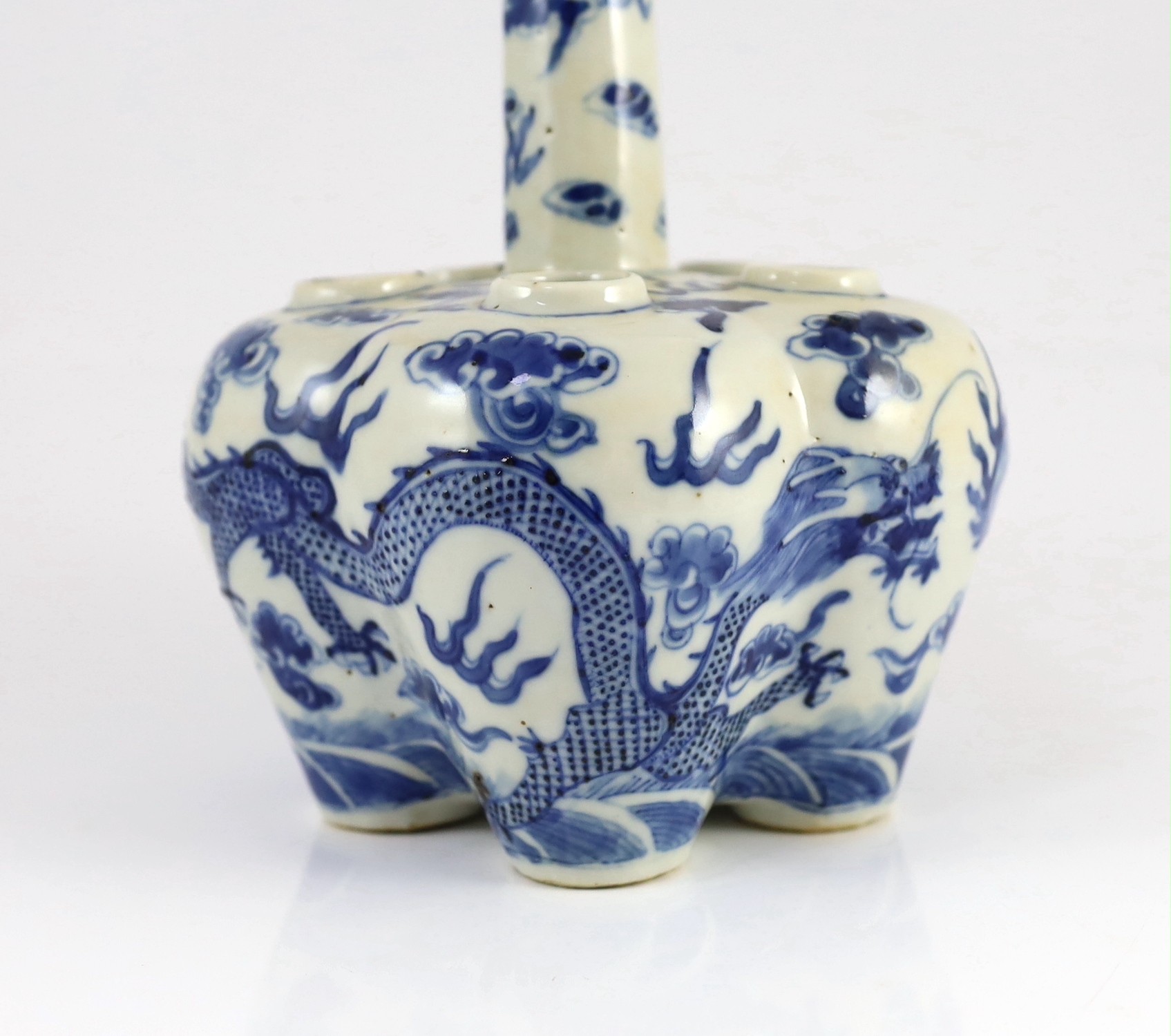 A Chinese blue and white ’dragon’ tulip vase, 19th century, 25cm high, splinter chips